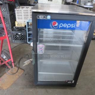 QBD Cooler Model DC6LP-HC, 120 Volt, with 3 racks. Measures 20.5"x26"x34". Features Pepsi branding, in working condition.