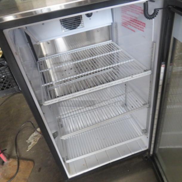 QBD cooler model DC6LP-HC, features 3 racks, measurements 20.5x26x34 inches, 120 volt, in working condition.