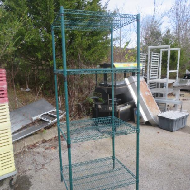 Green Metro shelf with 4 adjustable wire shelves, dimensions 30"x24"x75". Used condition, suitable for storage needs.