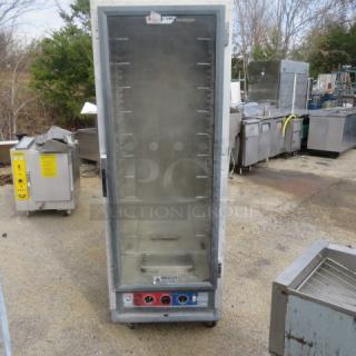 Metro C519-CFC-U Heat and Hold Cabinet, 120V, 25x30x70, stainless steel exterior, temperature controls visible.