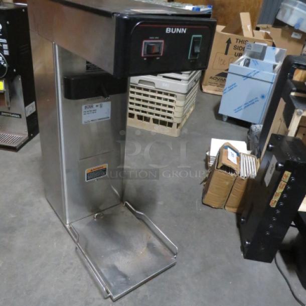 Bunn 3 Gallon Tea Brewer, Model TB3Q, in stainless steel. Features control panel and spout. Dimensions 12x21x31 inches.