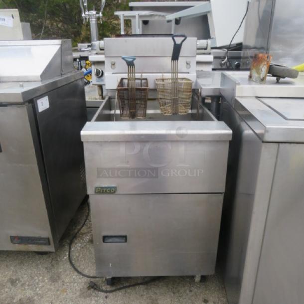 Pitco SG18 natural gas deep fryer with two baskets on casters, size 19.5"x34"x44". Used condition, model label visible.