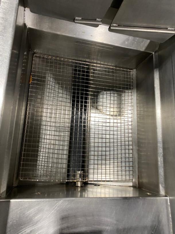 Frymaster dual-tank fryer, stainless steel, Model 2FQG30U0ZQTZBNG, natural gas, with basket hanger and easy-touch controls.