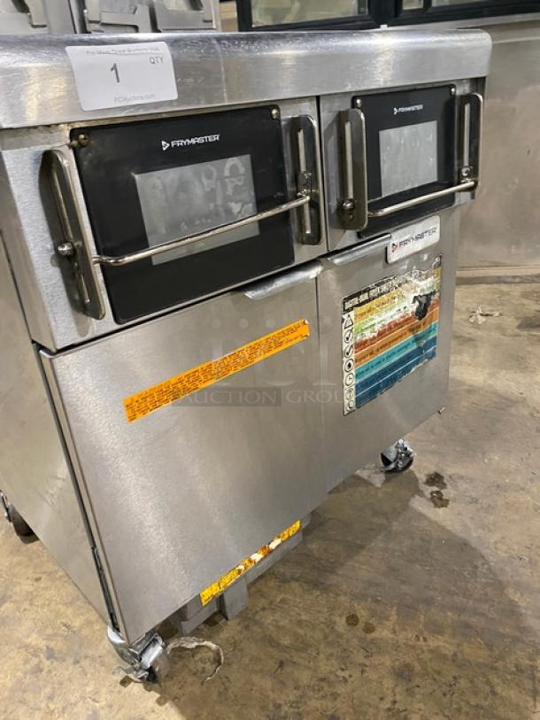 Frymaster stainless steel dual-tank deep fat fryer, model 2FQG30U0ZQTZBNG, with basket hanger, easy-touch control, on casters.