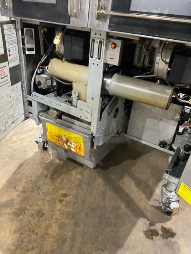 Frymaster dual-tank deep fat fryer, model 2FQG30U0ZQTZBNG, stainless steel, natural gas, on casters, easy-touch control.