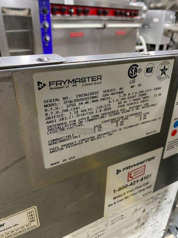 Frymaster 2FQG30U0ZQTZBNG stainless steel dual-tank fryer with backsplash, basket hanger, easy-touch control, on casters.