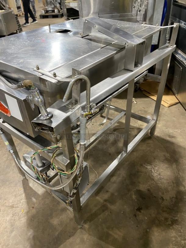 Groen NFHPE4 stainless steel 40 gal. natural gas tilt skillet with single spout faucet, on legs, used condition.