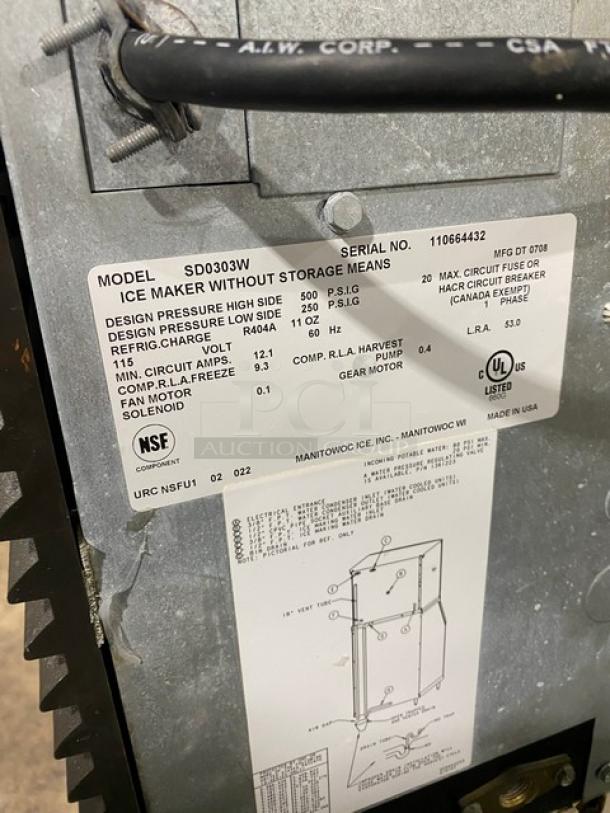 Manitowoc Ice Maker, Model SD0303W, SN 110664432. Stainless steel, electric-powered, water-cooled, NSF certified, 115V, 1 phase.