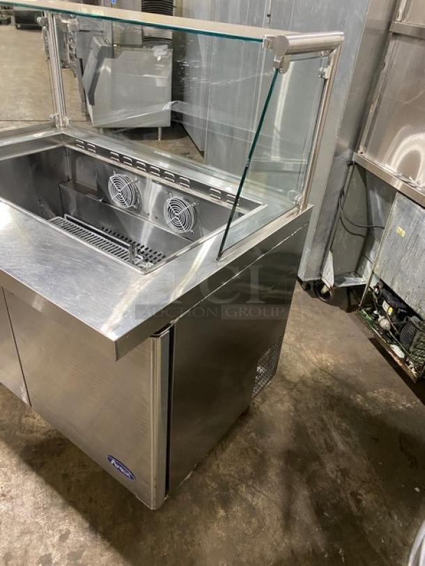 Atosa 2 Door Refrigerated Prep Table, Model MSF8306, stainless steel, with sneeze guard and poly coated rack, on casters.