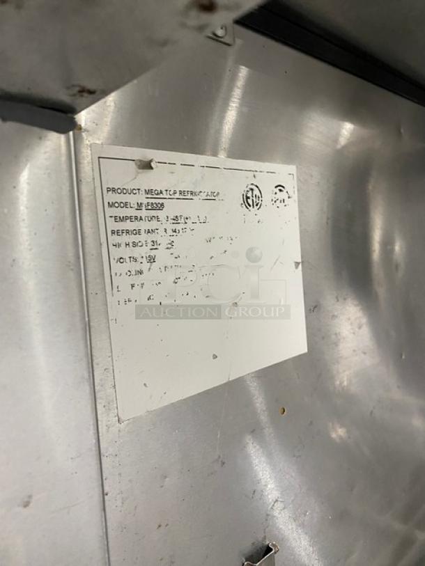 Atosa Commercial 2 Door Prep Table Model MSF8306, stainless steel, with sneeze guard and poly-coated wire rack, on casters.