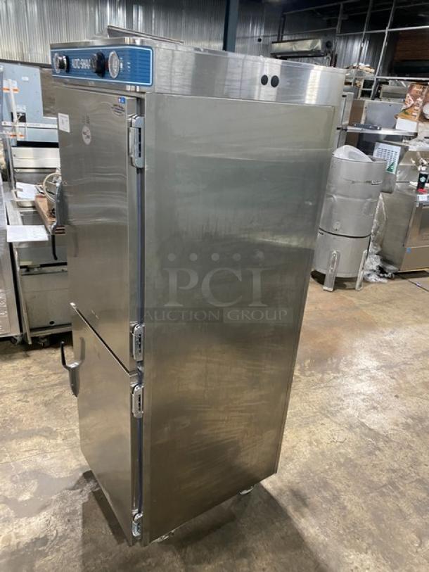 Alto-Shaam stainless steel dual-compartment Dutch door heated cabinet, Model 1200UPSR, with wired rack, upper/lower controls.