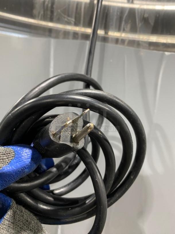 Alto-Shaam 1200-UP/SR commercial heated cabinet power cord, stainless steel, dual-compartment, on casters, visible plug.