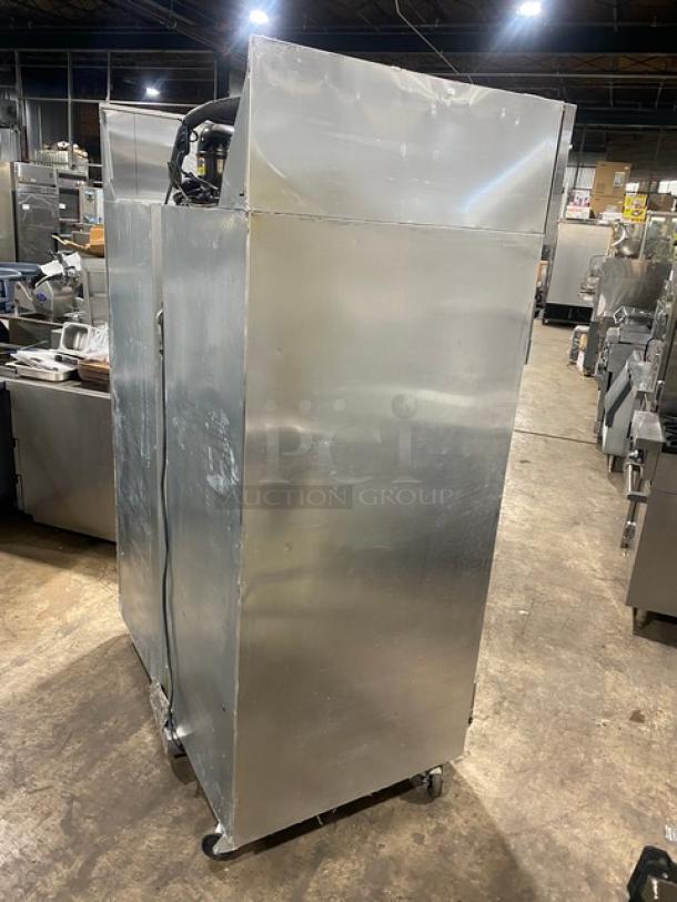 Continental 2F stainless steel 2-door reach-in freezer on casters, with poly-coated wired rack. Model 2F SN: 159A2367, 115V 1 Phase.