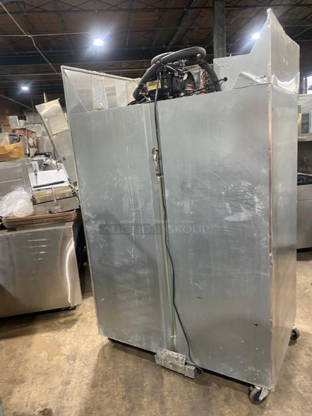 Continental 2F stainless steel 2-door reach-in freezer, poly coated wire rack, on casters. Model: 2F SN: 159A2367, 115V 1 phase.