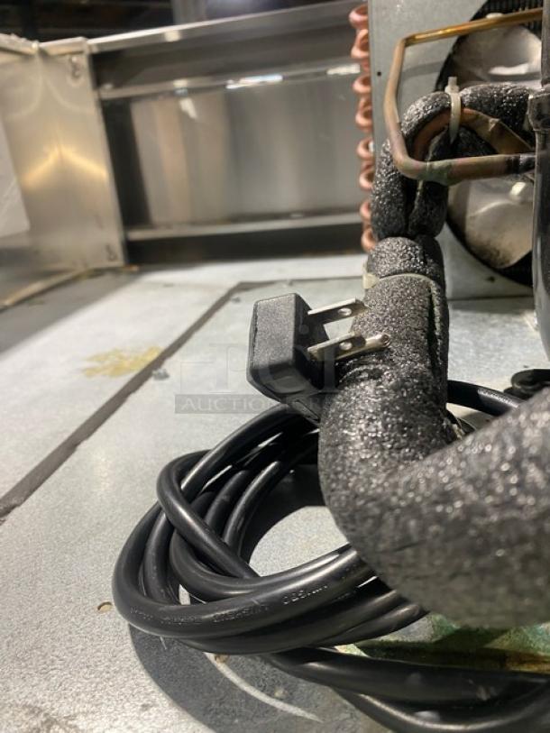 Continental 2F stainless steel reach-in freezer, solid 2 doors, poly-coated racks, 115V, 1 phase, on casters, serial 159A2367.