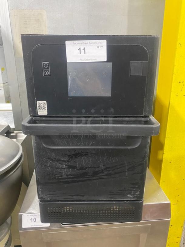 MerryChef Eikon E2S black countertop high-speed rapid cook oven, electric powered, 208/240V, 1 phase, in good condition.
