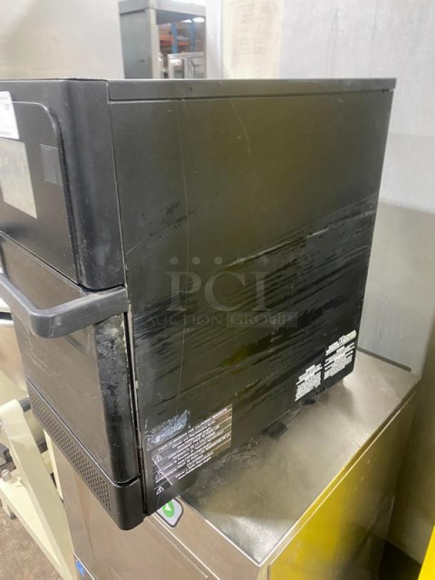 MerryChef Eikon E2S commercial black electric rapid cook oven, late model, 208/240V, countertop design, visible wear.