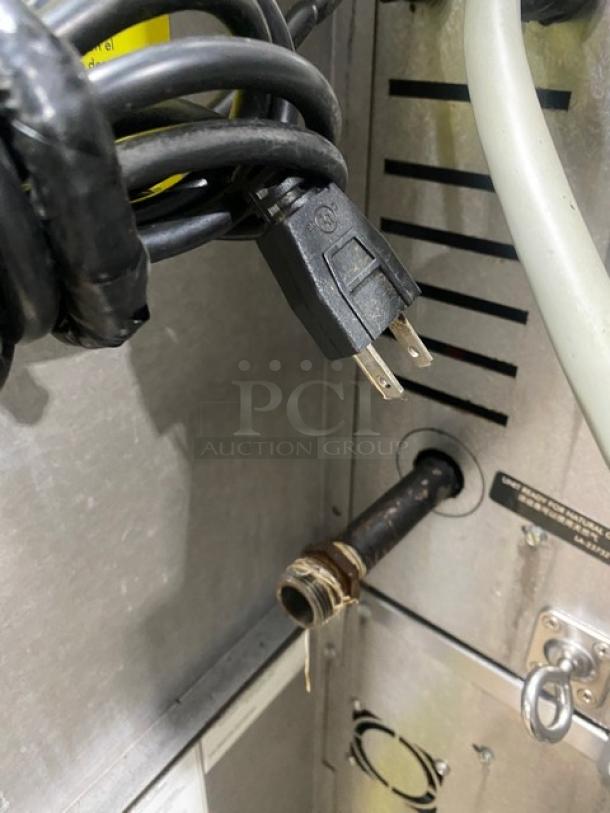 Alto-Shaam ASC4G stainless steel convection oven, natural gas, thermostatic controls, wired rack, 120V, on casters.