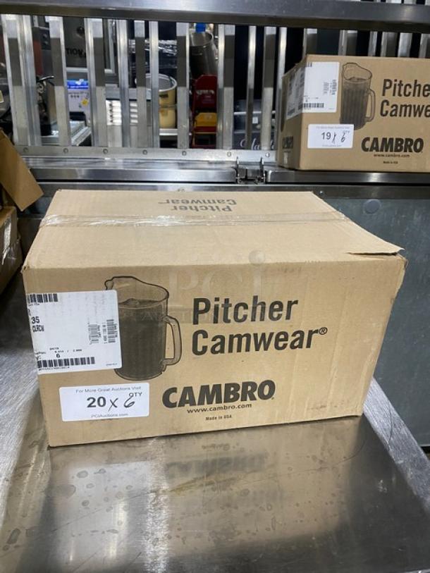 Brand new Cambro Camwear 60 oz. clear beverage pitcher, model P60CW135, in original box. Box shows product images and details.