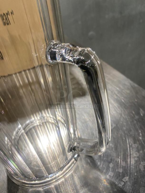 Brand new Cambro Camwear 60 oz clear beverage pitcher, model P60CW135, with sturdy handle, ideal for commercial use.