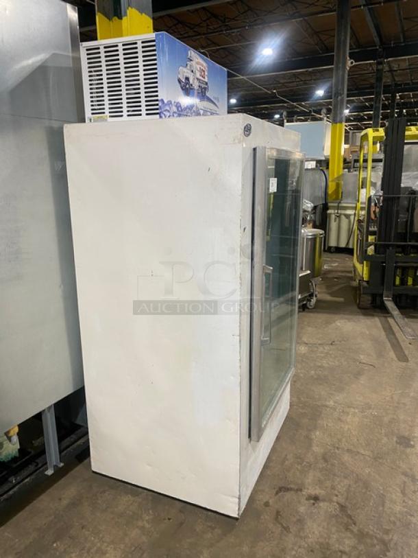 Leer Commercial Ice Merchandiser Freezer, Model 301UC25MG, white with single glass swing door, indoor use, good condition.