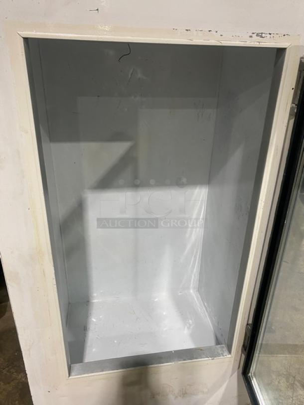 Leer Commercial White Single Glass Swing Door Reach-In Ice Merchandiser Freezer, Model 301UC25MG, in fair condition.