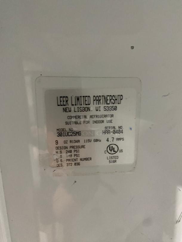 Leer Commercial White Single Glass Swing Door Reach-In Indoor Ice Merchandiser Freezer, Model 301UC25MG, SN: HAA-0404, 115V, UL listed.