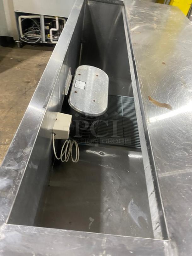 Leader Commercial Stainless Steel 3 Door Refrigerated Salad/Sandwich Prep Table, 115V, poly coated wired rack, on casters.