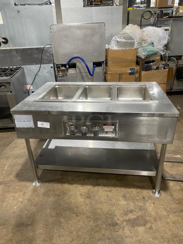 Wells MOD300TDM stainless steel 3-well hot food steamtable with undershelf, 208/240V, on legs. Serial: M3TD0616A0016.