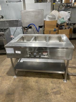 Wells MOD300TDM stainless steel 3-well hot food steamtable with undershelf, 208/240V, on legs. Serial: M3TD0616A0016.