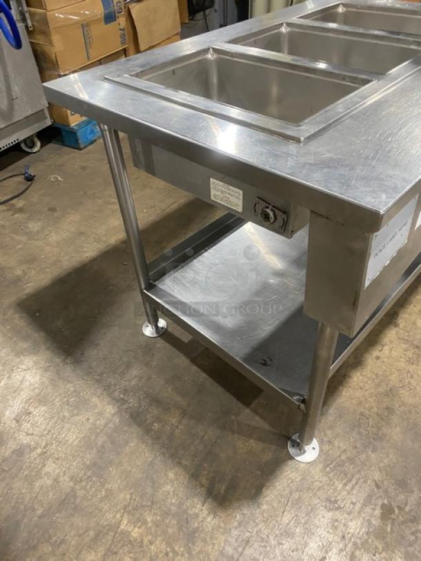 Wells MOD300TDM stainless steel 3-well steamtable, electric-powered, single undershelf, on legs, 208/240V, excellent condition.