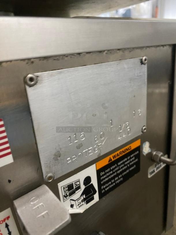 Commercial stainless steel electric burger patty forming machine, 115V, 1 phase, with visible warning label and on/off switch.