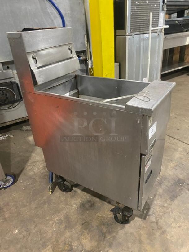 Pitco VF35 stainless steel natural gas deep fryer, 35 lb. capacity, with backsplash, basket hanger, fry basket, hose, on casters.