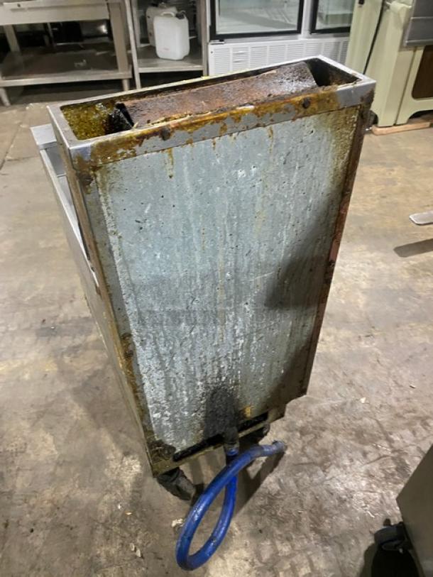 Pitco VF35 stainless steel natural gas fryer, 35 lb capacity, with backsplash, basket hanger, fry basket, and gas hose, on casters.