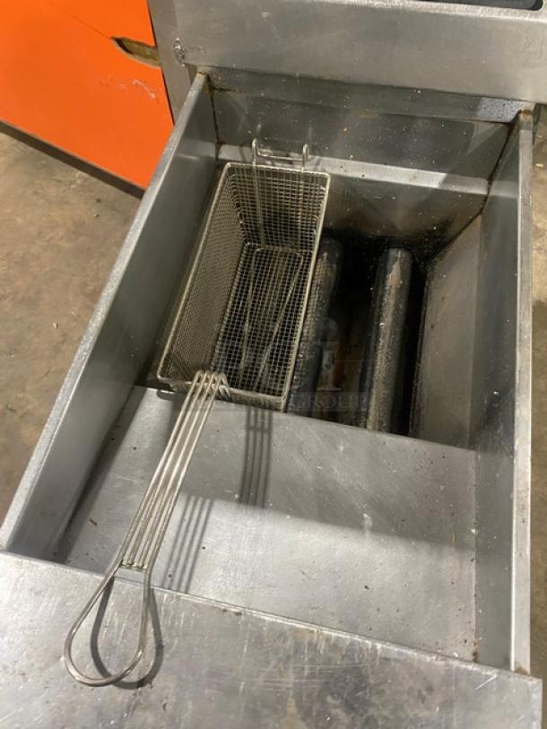 Pitco VF35 commercial stainless steel deep fat fryer, 35 lb capacity, with basket, backsplash, and gas connection hose, on casters.