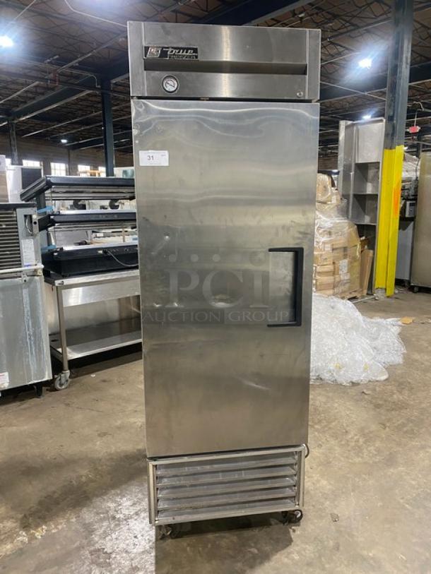 True T-23F commercial stainless steel single door freezer, with poly coated wire rack, on casters, model SN: 5175087.