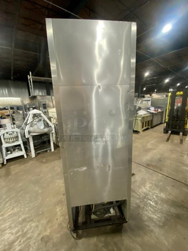 True T-23F single door stainless steel freezer with poly-coated rack, model T-23F SN: 5175087, 115V, on casters.