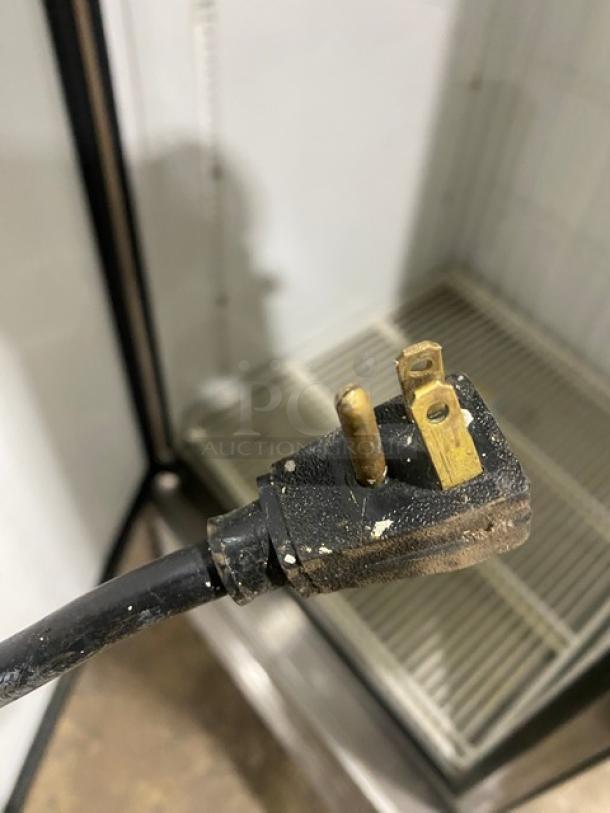 True T-23F commercial stainless steel freezer, single door, poly-coated rack, on casters, 115V, 1 phase, SN: 5175087.