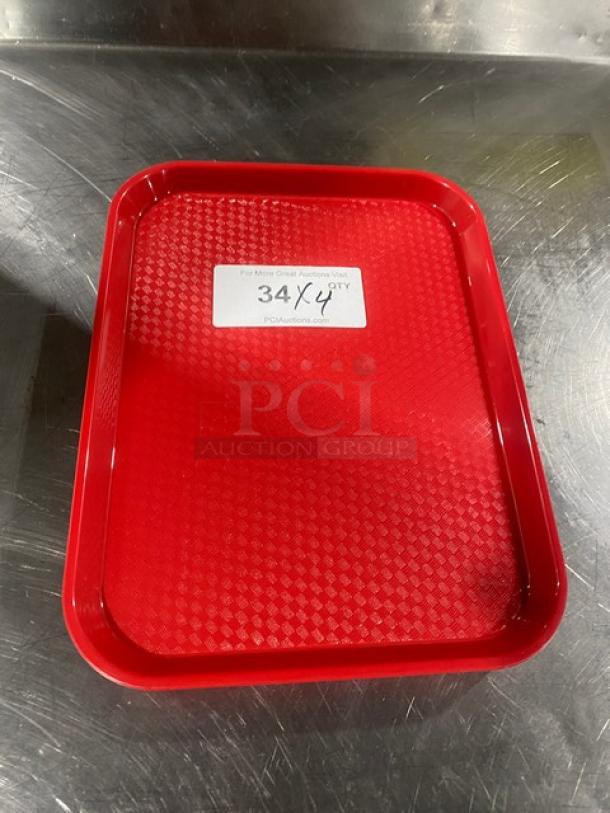 Cambro Commercial Red Rectangular Serving Tray, Model 1014FF163. Features textured surface, pristine condition, auction lot tag 34x4.