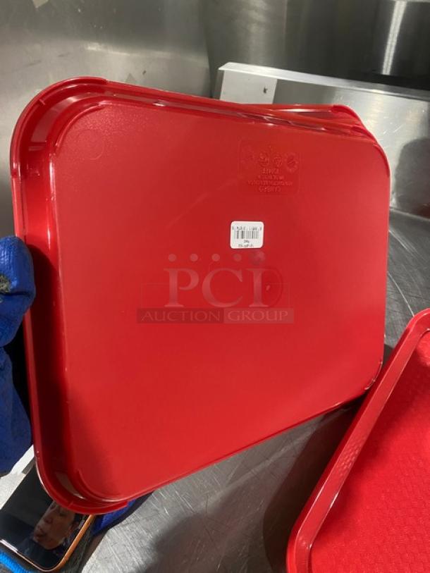 Cambro commercial red serving tray, model 1014FF163, in excellent condition. Rectangular shape with textured surface.