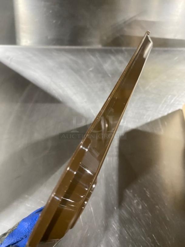 Cambro 10"x14" brown serving tray, model 1014FF167, in new condition, durable rectangular design.