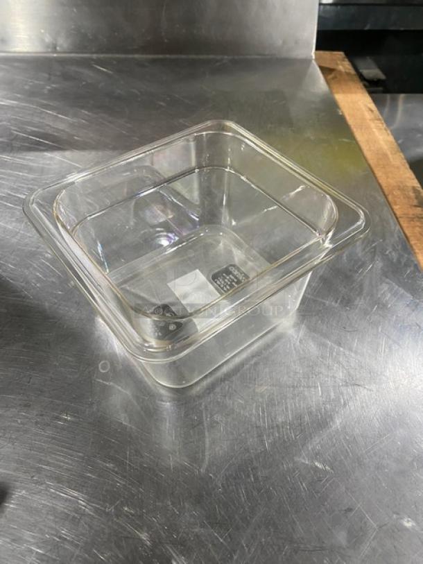 Winco SP7604 clear polycarbonate food pan, 1/6 size, 4" deep, new condition, commercial-grade quality.