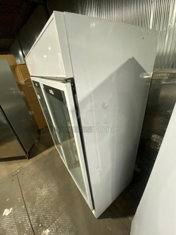 Beverage-Air MT49W commercial refrigerator, stainless steel, double glass doors, poly-coated wire rack, 115V, SN: 6766445.