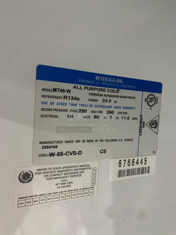 Beverage-Air MT49-W label showing model, serial number 6766445, specs: 115V, 1 phase, R134a refrigerant.