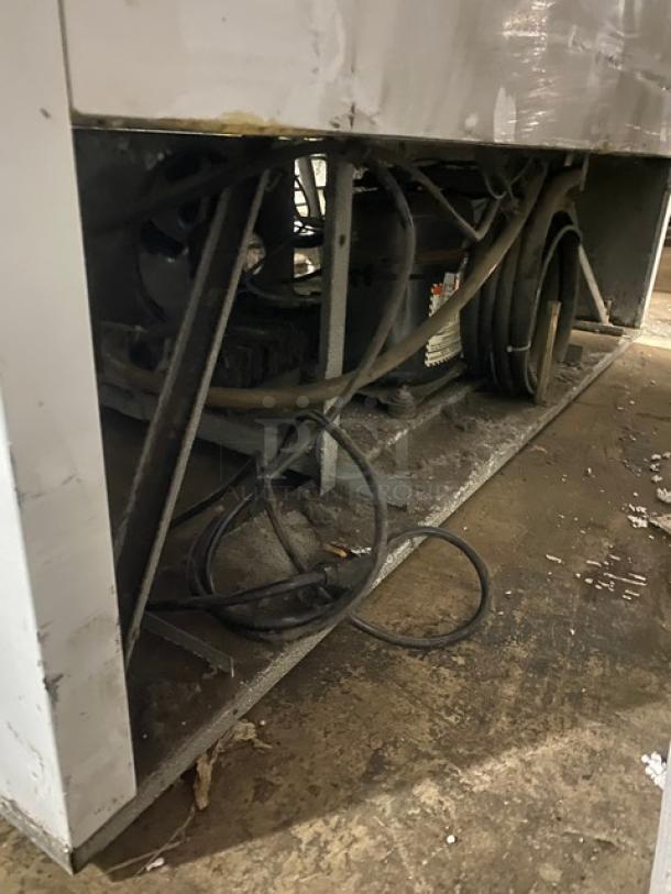 Beverage-Air MT49W compressor view, wear visible; stainless steel double glass door merchandiser, 115V, model tag SN: 6766445.