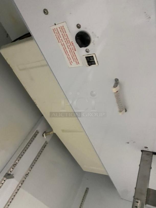 Beverage-Air Commercial Refrigerator, Model MT49, white interior, glass doors, adjustable wire shelves, 115V 1 phase.