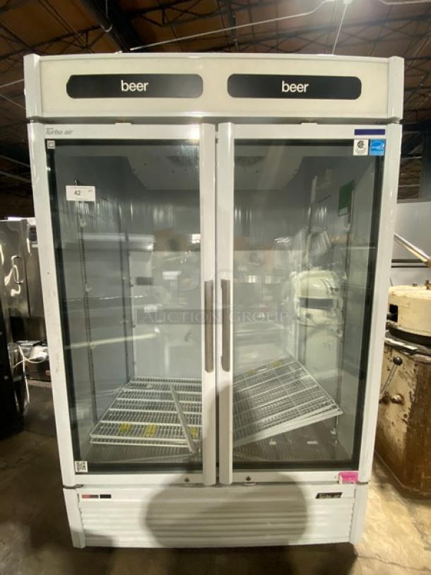 Turbo Air TGM-47SDW commercial refrigerator, double glass doors, Energy Star, poly-coated racks, on casters, model SN: RS47WBY564.