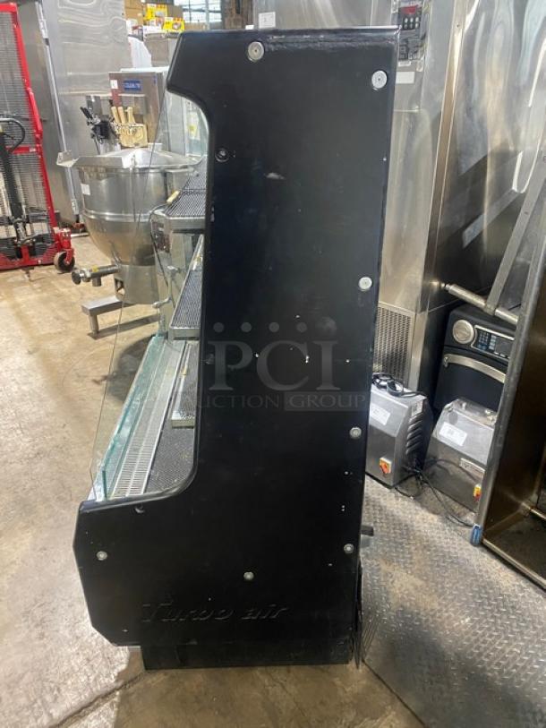 Turbo Air TOM-40M(B) black stainless steel refrigerated open display case, multi-tier, model number visible, used condition.