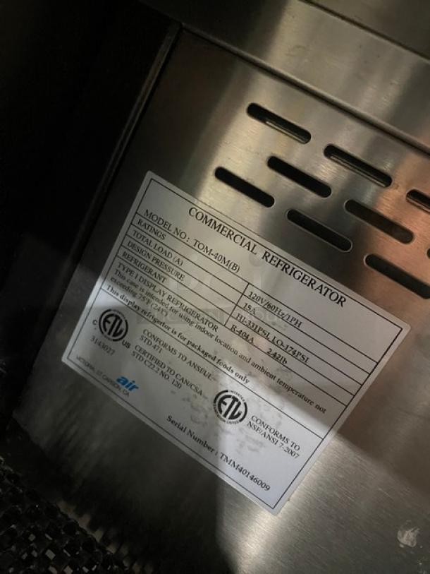 Turbo Air TOM-40M(B) Commercial Refrigerated Display Case label. Model: TOM40MB, Serial: TMM40146009, 120V 1 Phase.
