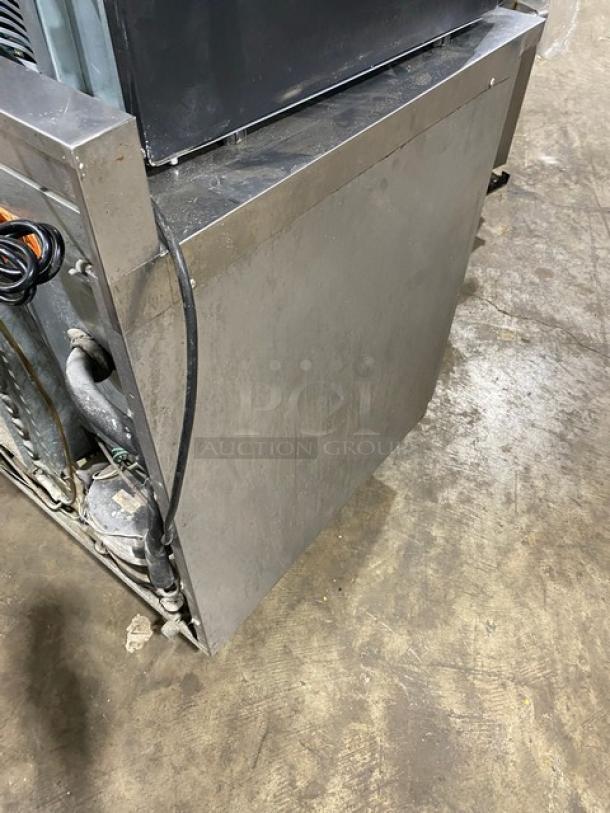 Delfield Enodis Series stainless steel worktop refrigerator, Model 402, with upturned back splash and casters, 115V.